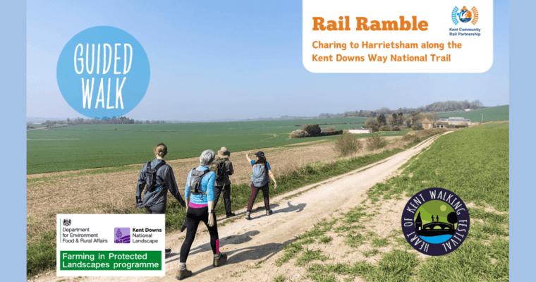 Image shows a group of walkers walking along a gravel path in the countryside. Image includes logos.