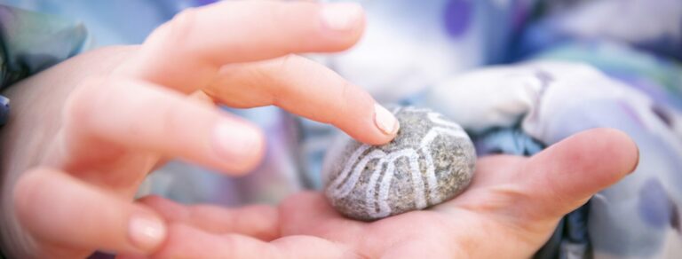 A child holding pebble