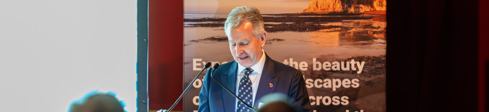 07 11 2025 Speakers John Keefe 2 2 Aspect Ratio 1600 367